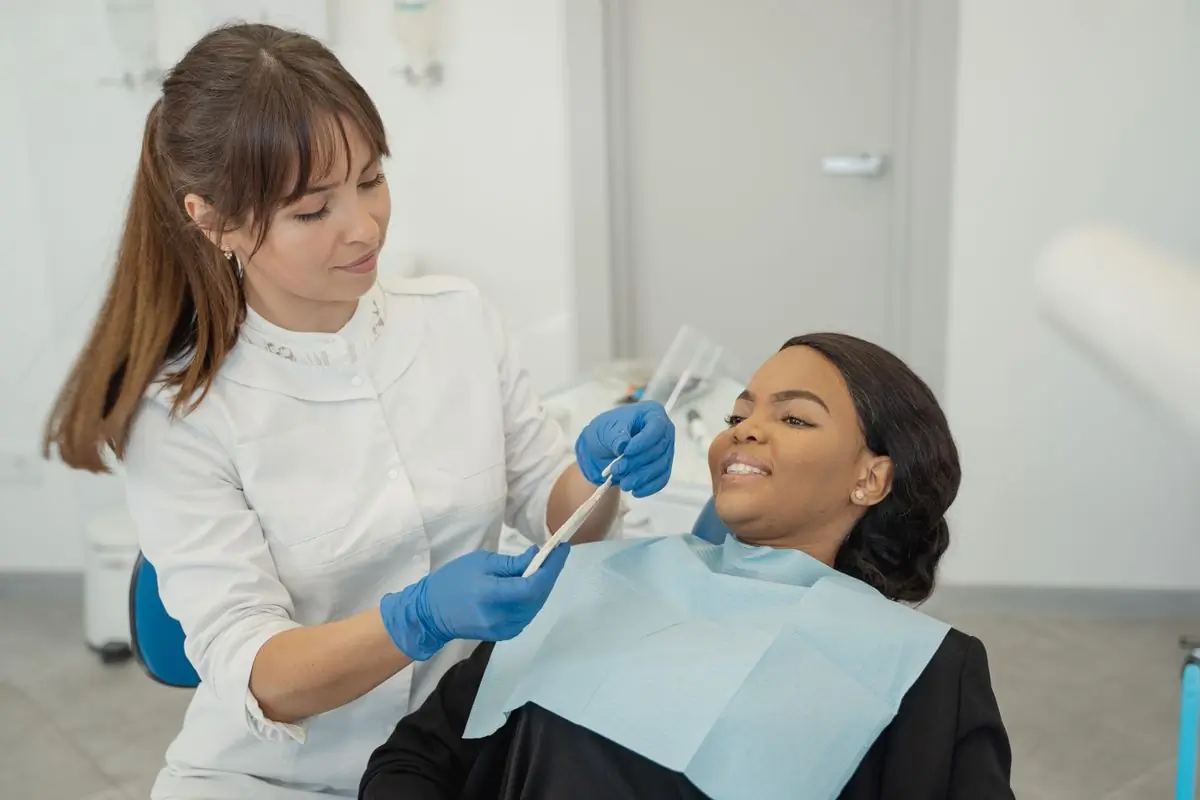 A patient having an appointment with one of the clinic's dentists