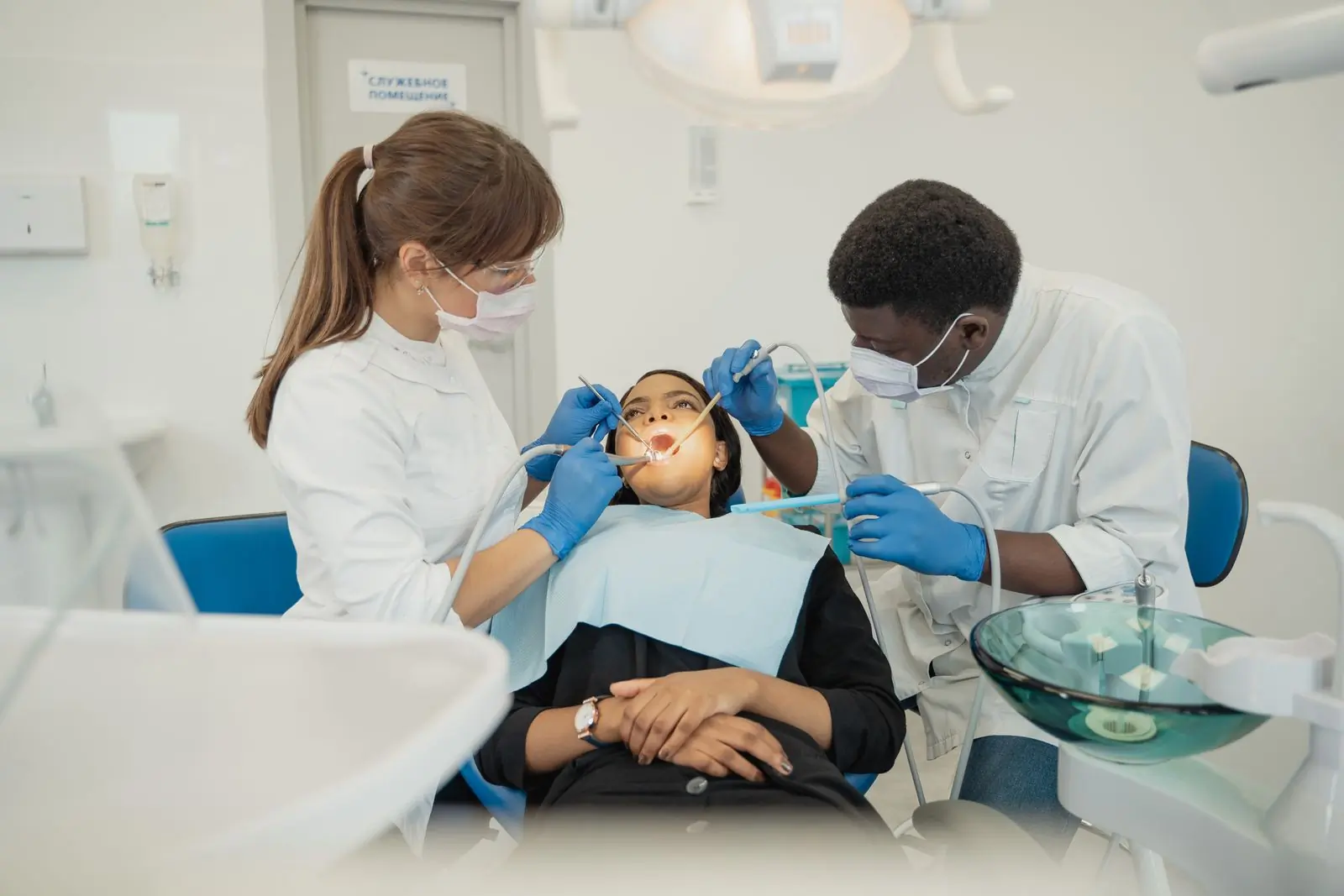 Two of the clinic's clinicians working together during a treatment