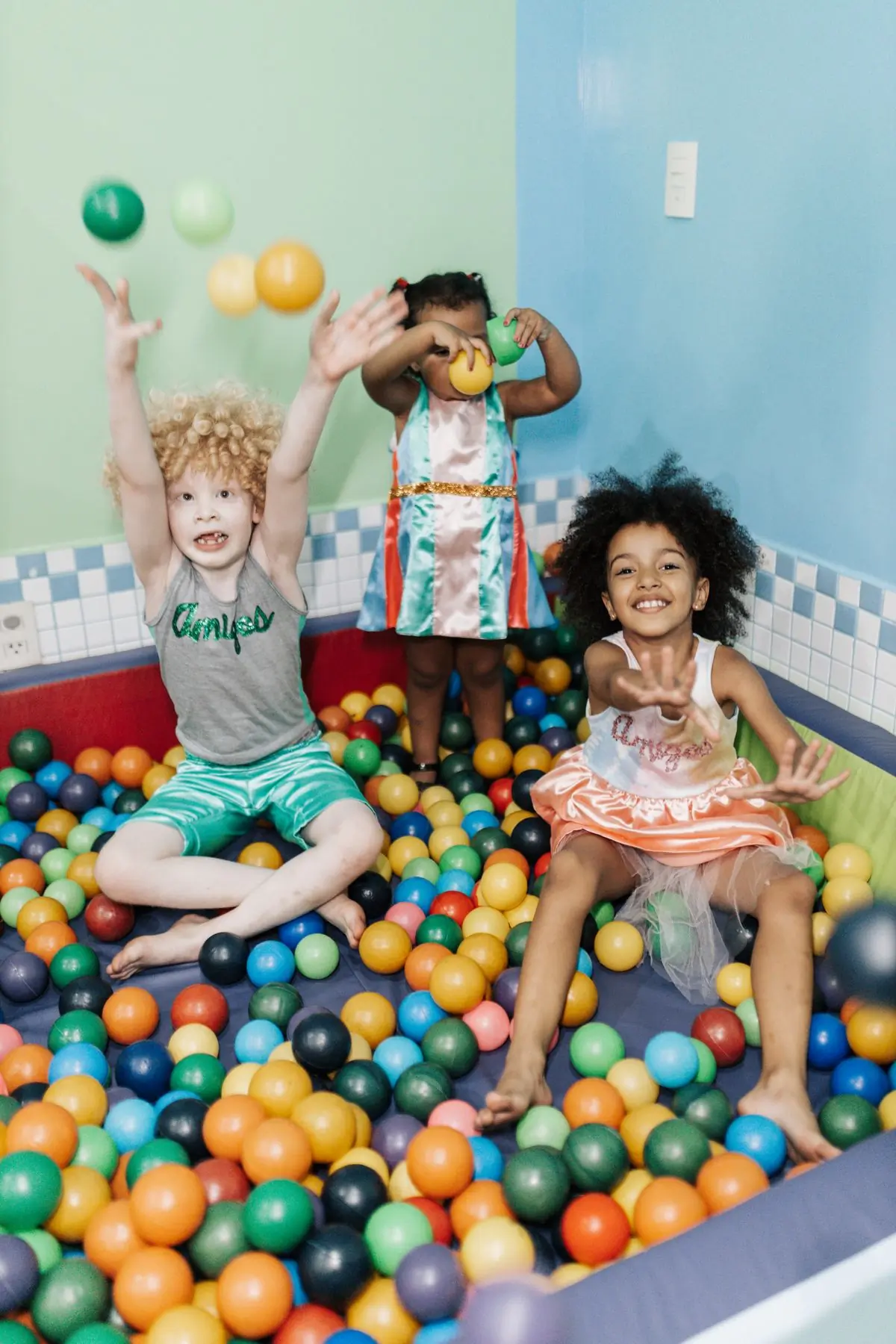 Children playing in the ball pit on the hospital's play floor