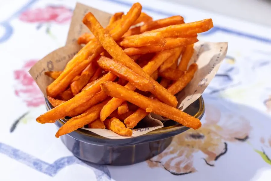 A bowl of crisp sweet potato fries