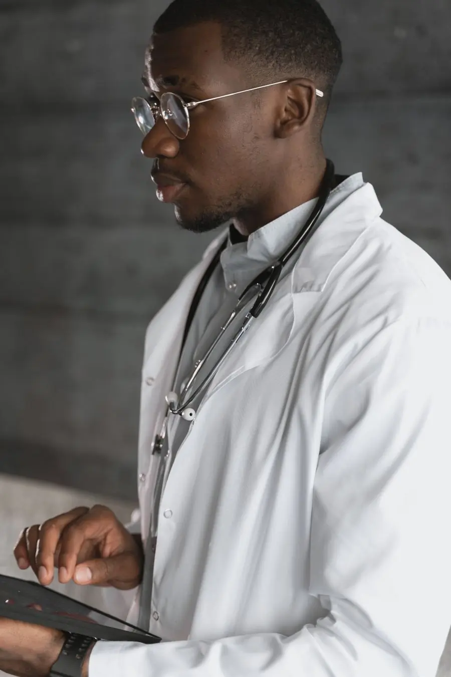 Dr. Yaw Boateng, consultant neurologist, in a white coat