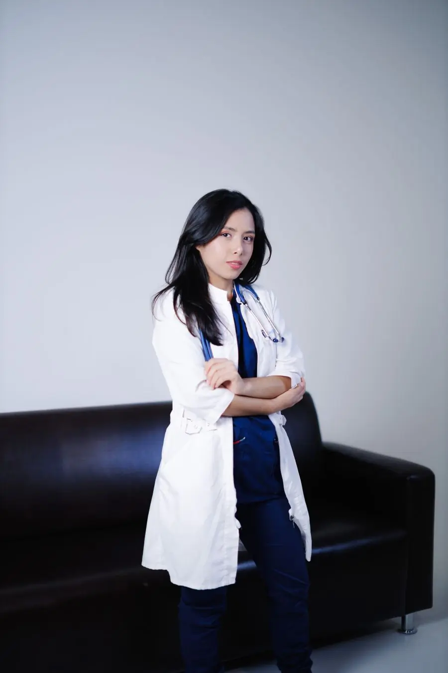 Dr. Mei-Ling Chen, ophthalmologist, in professional attire