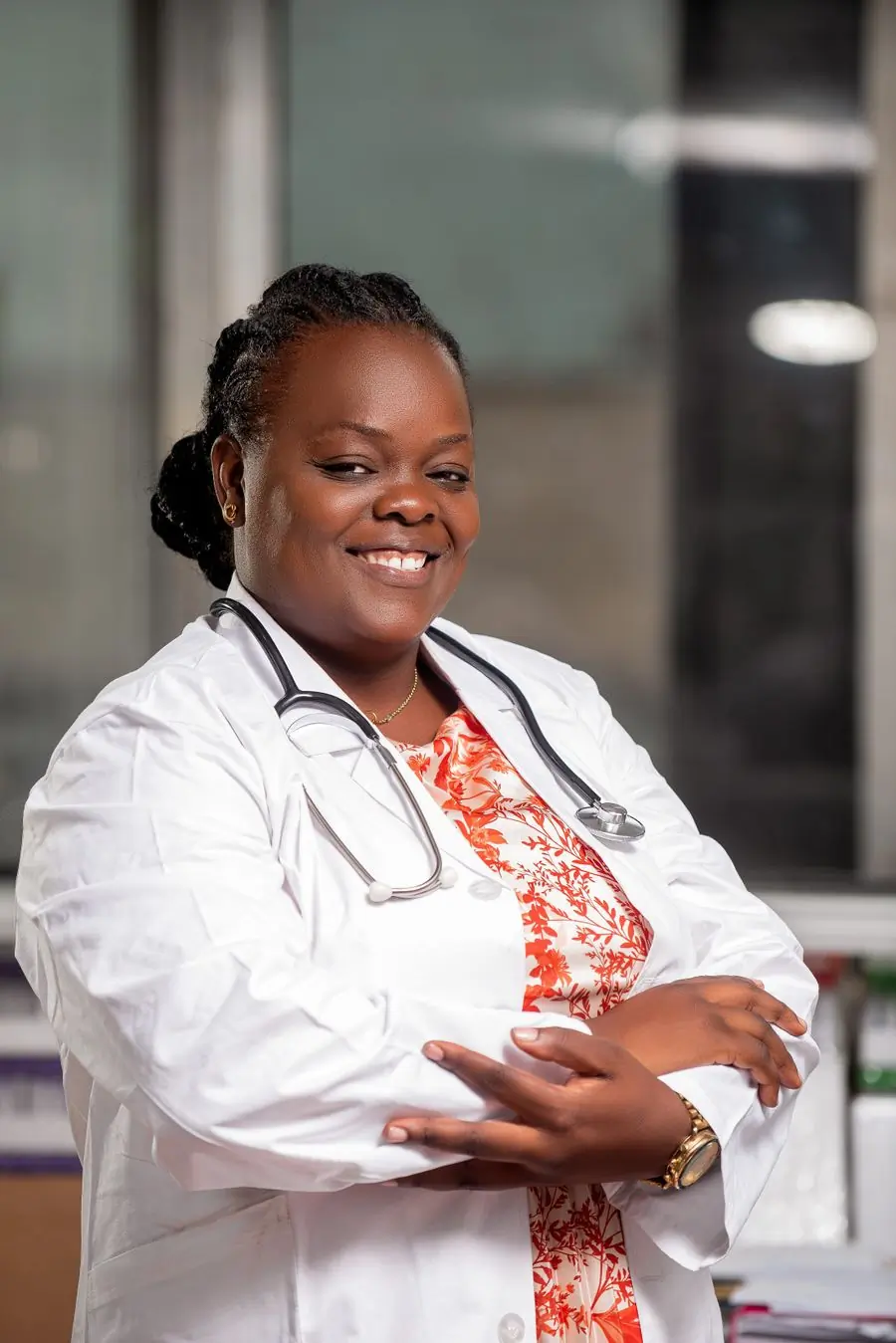 Dr. Serwaa Mensah, family physician, in a clinic coat