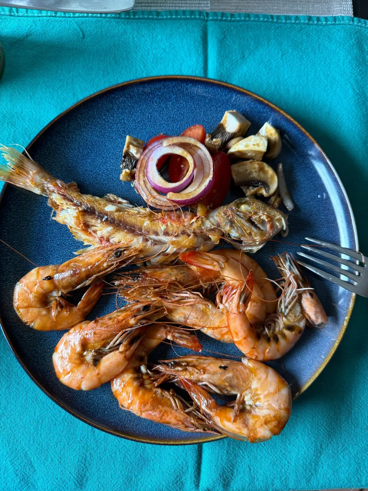 A seafood platter of grilled fish and prawns