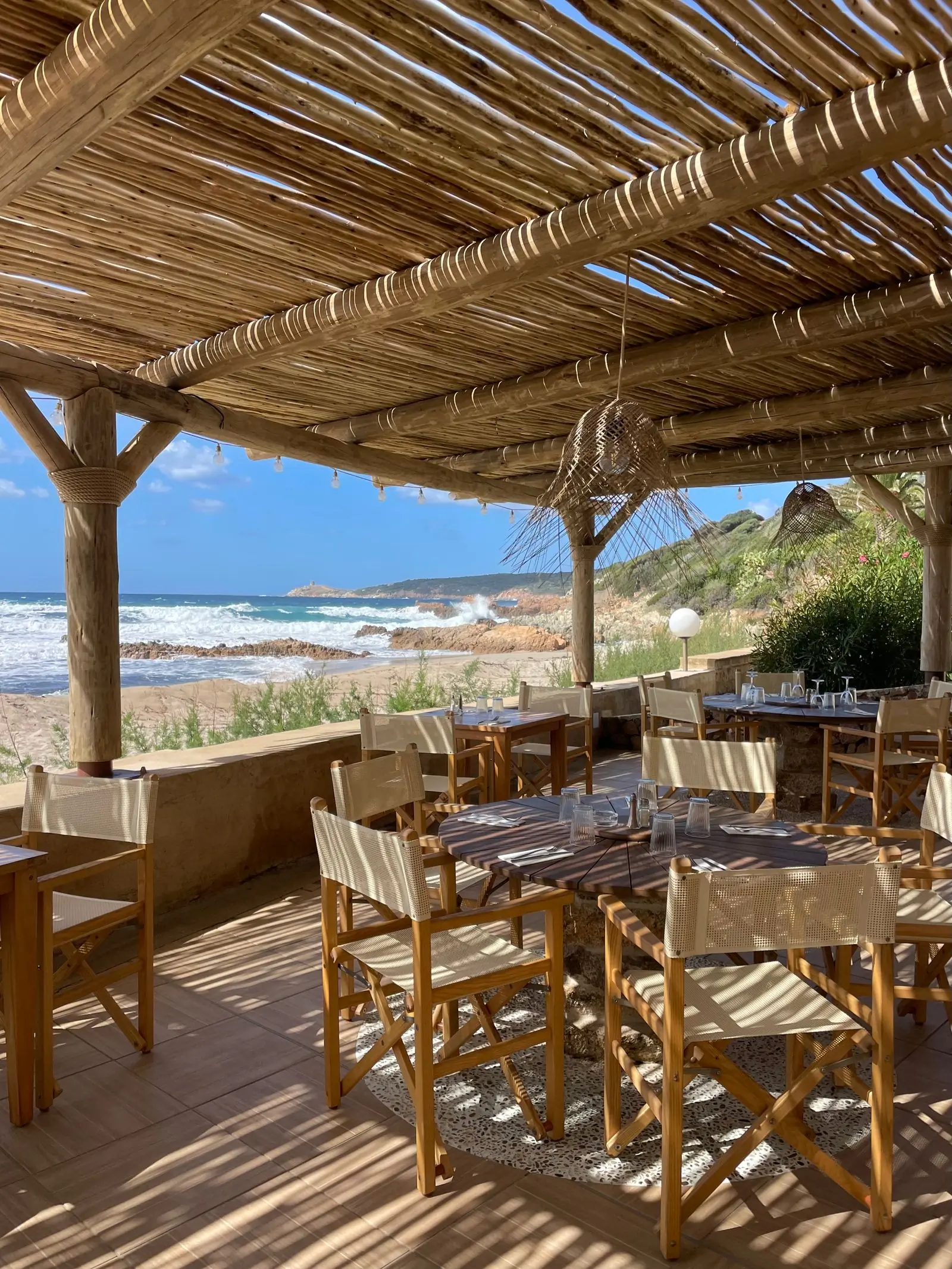 The terrace laid out above the beach