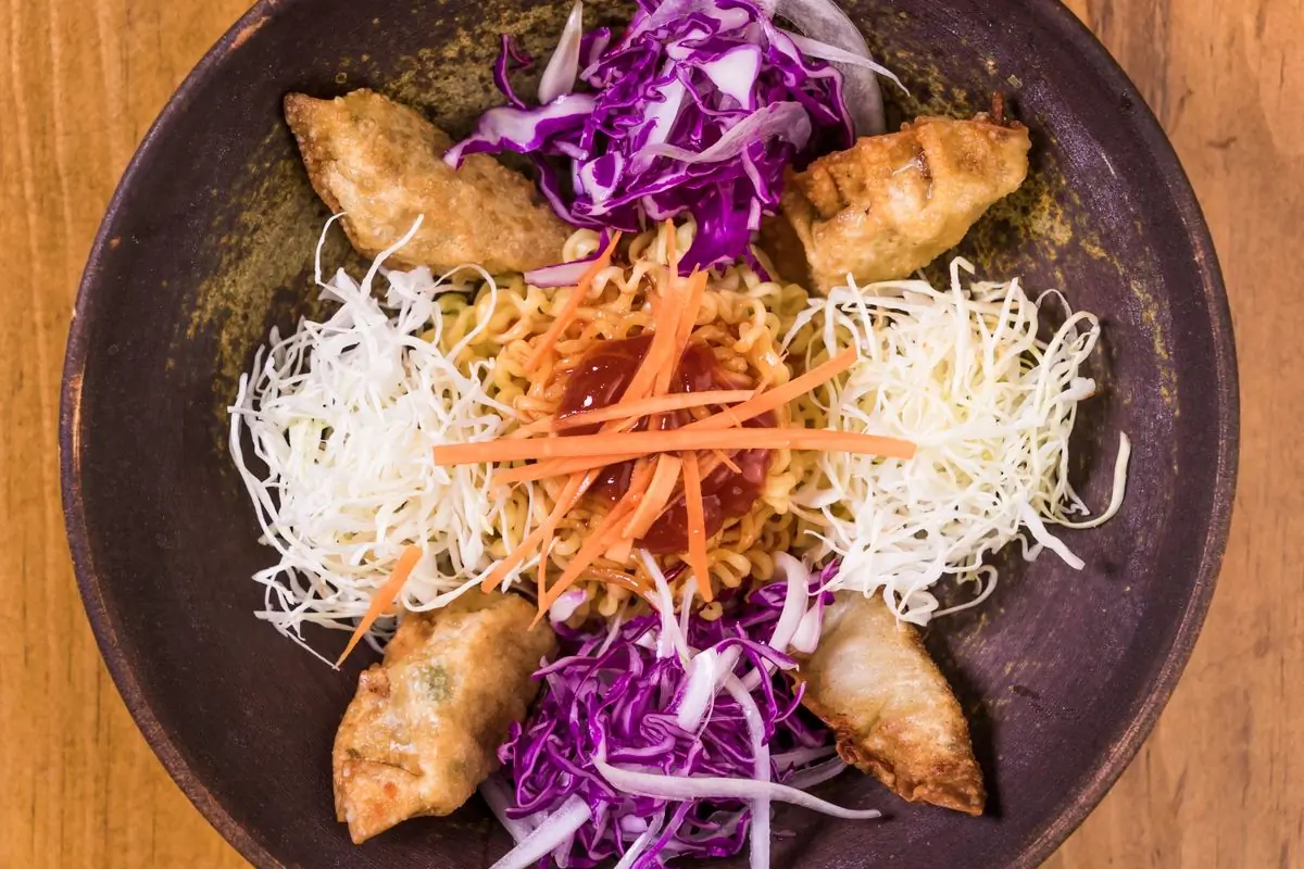 Noodles with fried dumplings photographed from above