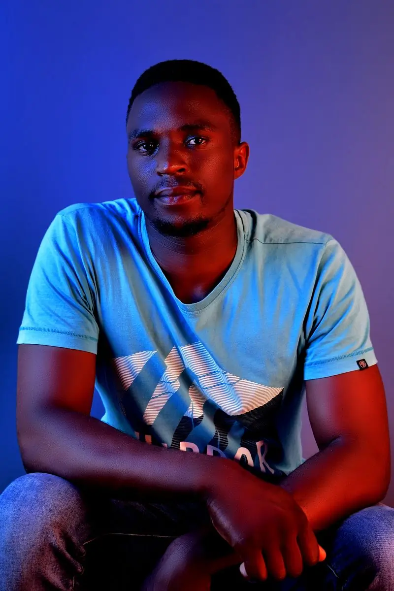 Selorm Agbeko, video and LED lead, lit in blue