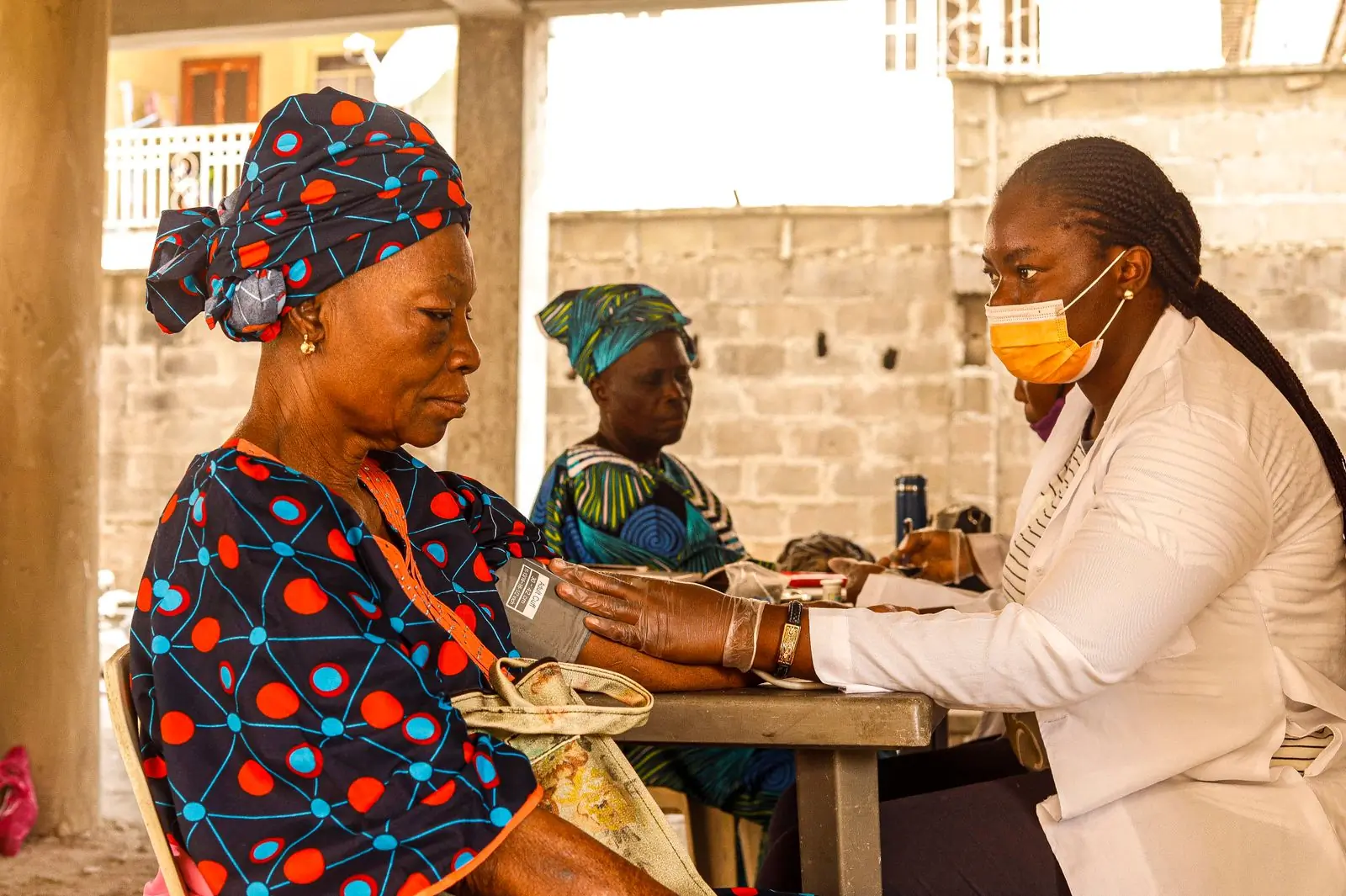 A blood-pressure check at a community clinic
